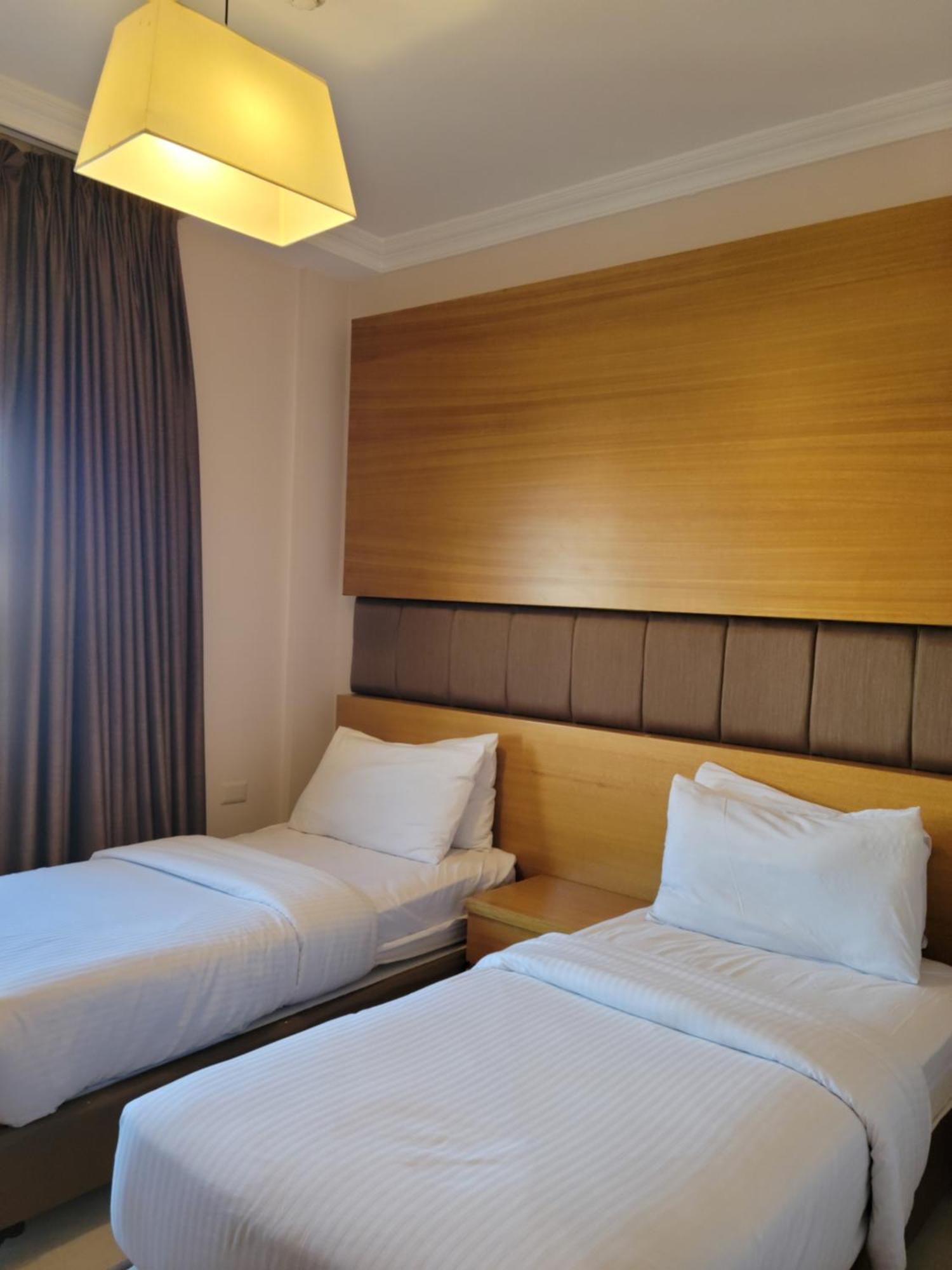 Big Ben Hotel Suites Амман Экстерьер фото