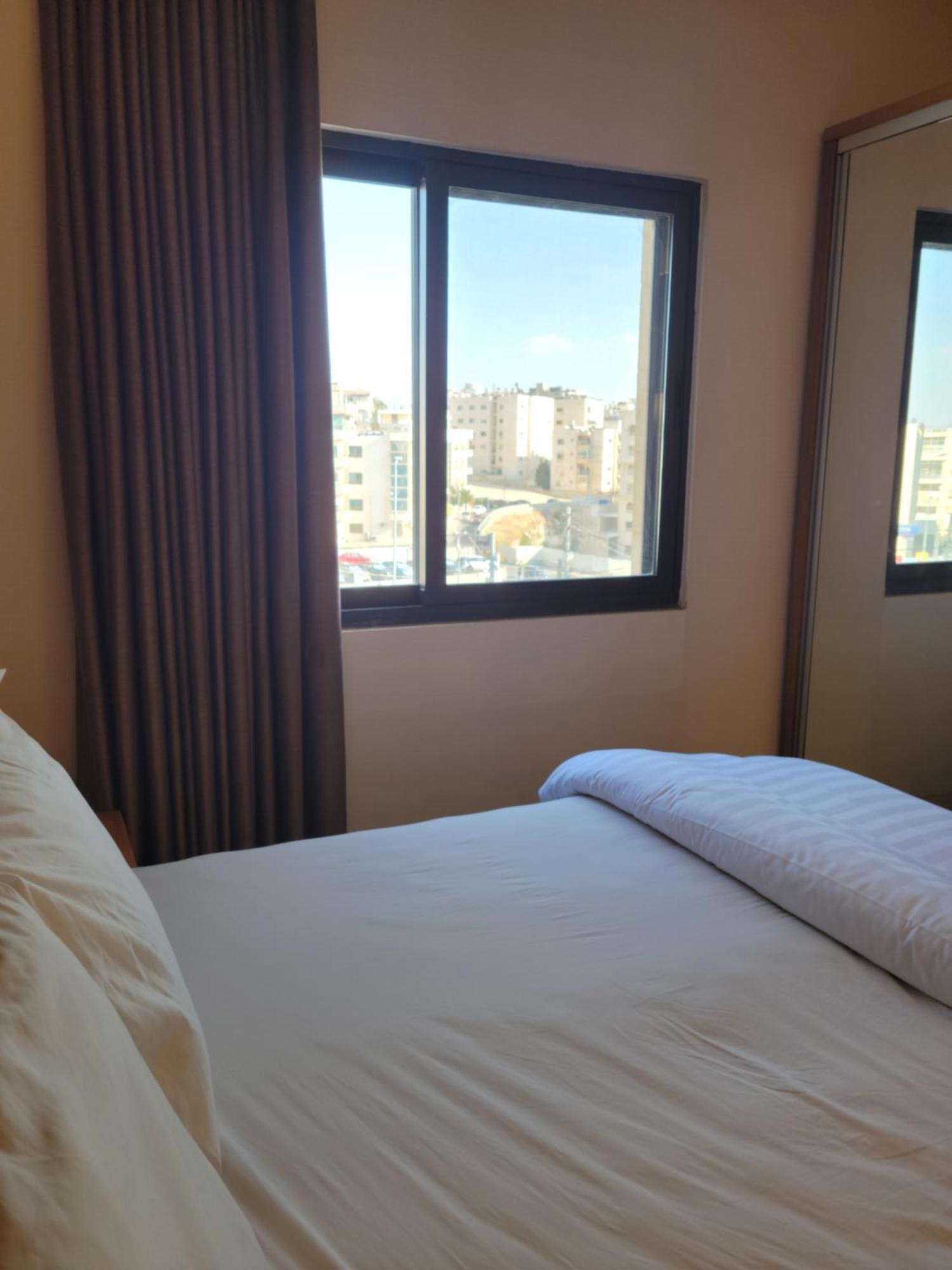 Big Ben Hotel Suites Амман Экстерьер фото